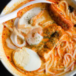 A bowl of curry laksa